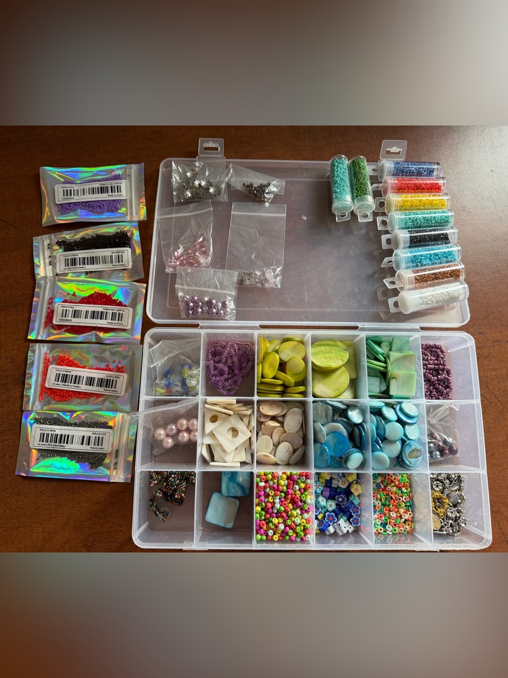 Large lot of beads with container